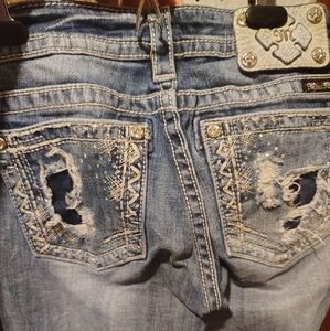 Blue Boyfriend Jeans with Gold Stitching and Distressed Details